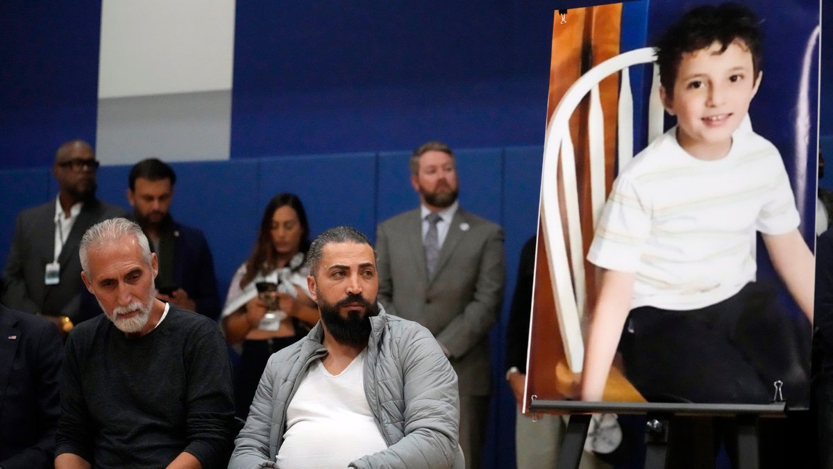 Wadea Al Fayoume's father and uncle attend a vigil for Wadea